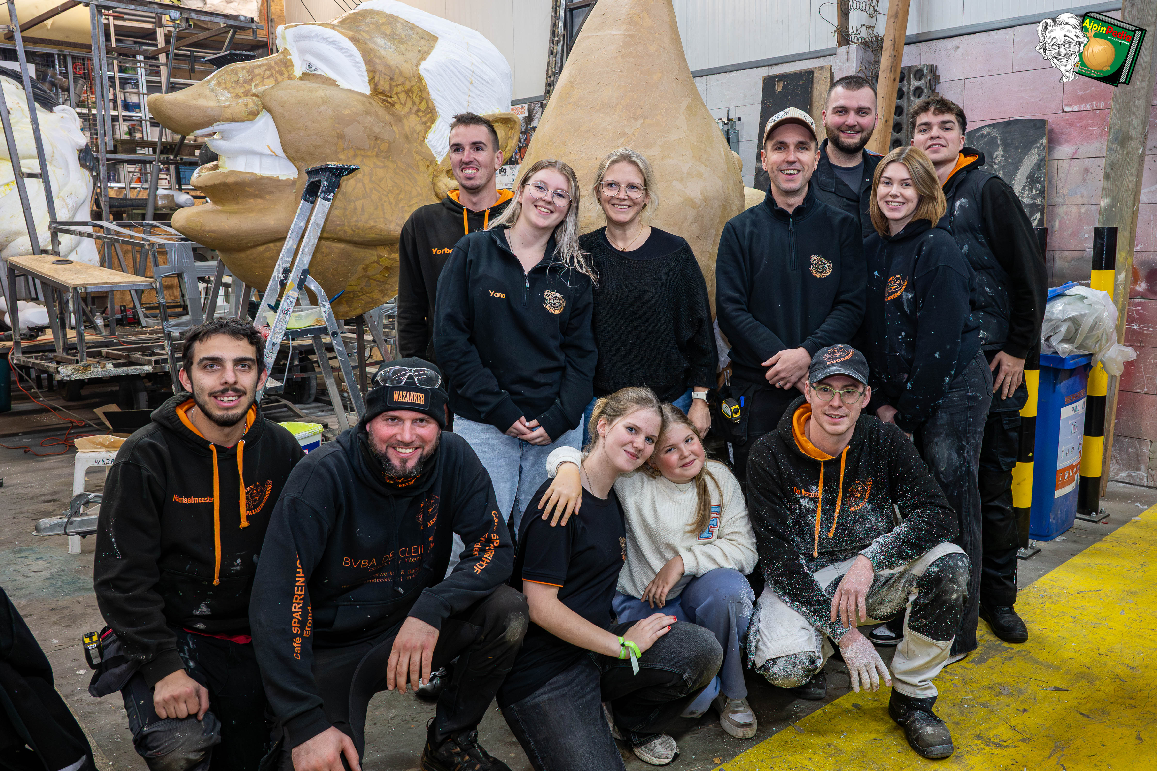 Aalst Carnaval 2026 - Stoetthema AKV Wazakkermedoeng: 'T zitj in ieder van ons zèn systeem ... Oilsjt Es De Kreem!'